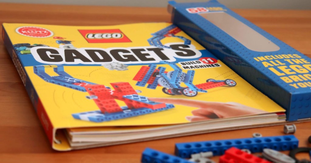 lego gadgets klutz book on table with lego pieces around it