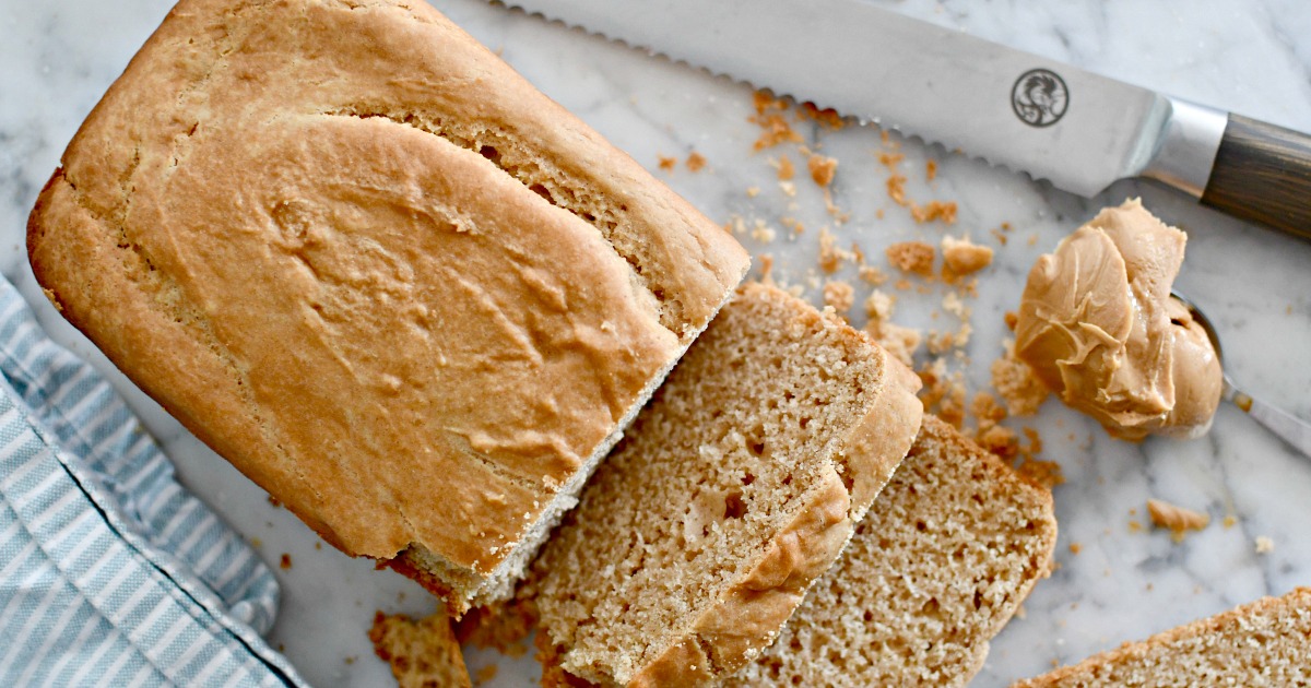 loaf of peanut butter bread on a cutting board 