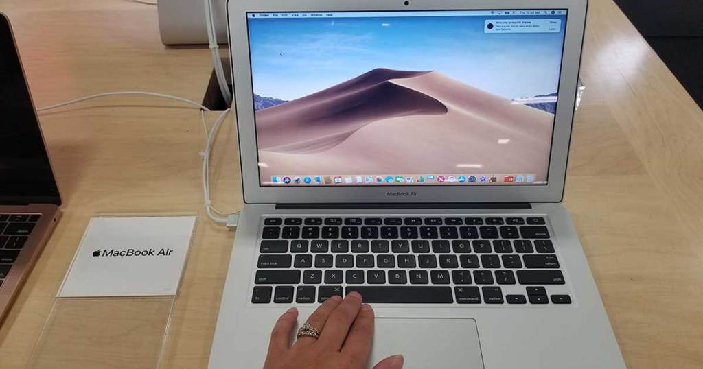 woman using MacBook Air