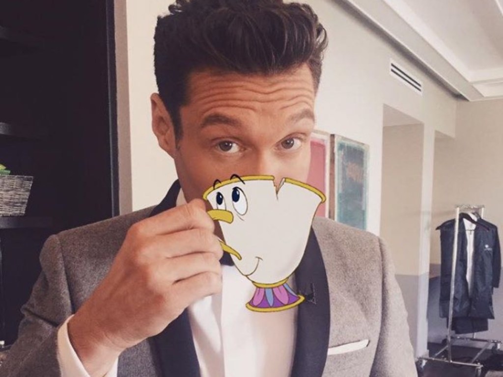 Ryan Seacrest drinking from animated cup