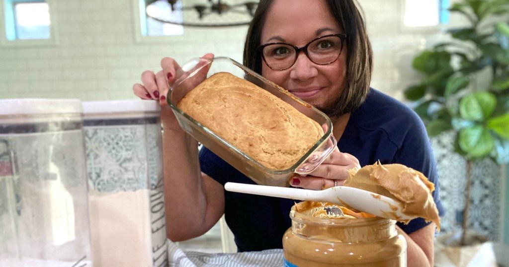 woman holding peanut butter bread