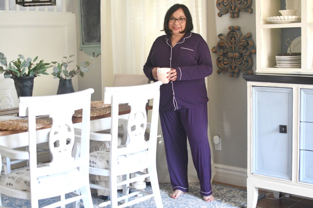 woman in purple amazon pajamas in the dining room