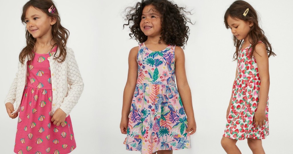 three little girls wearing summer dresses