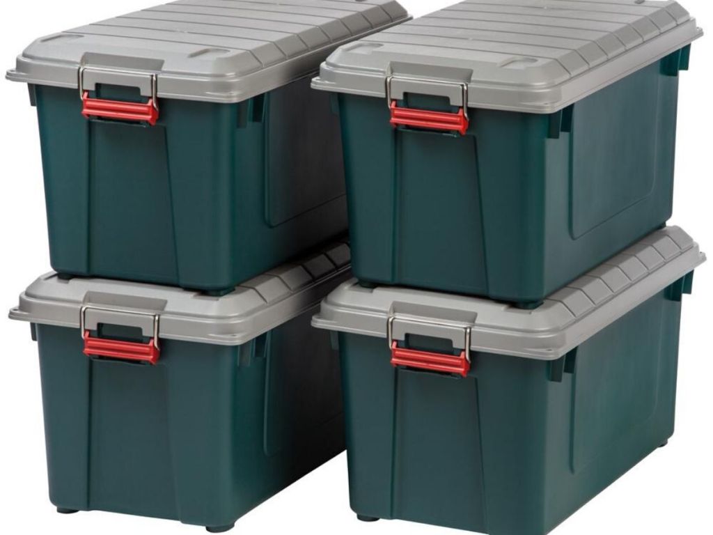 four large heavy duty storage containers