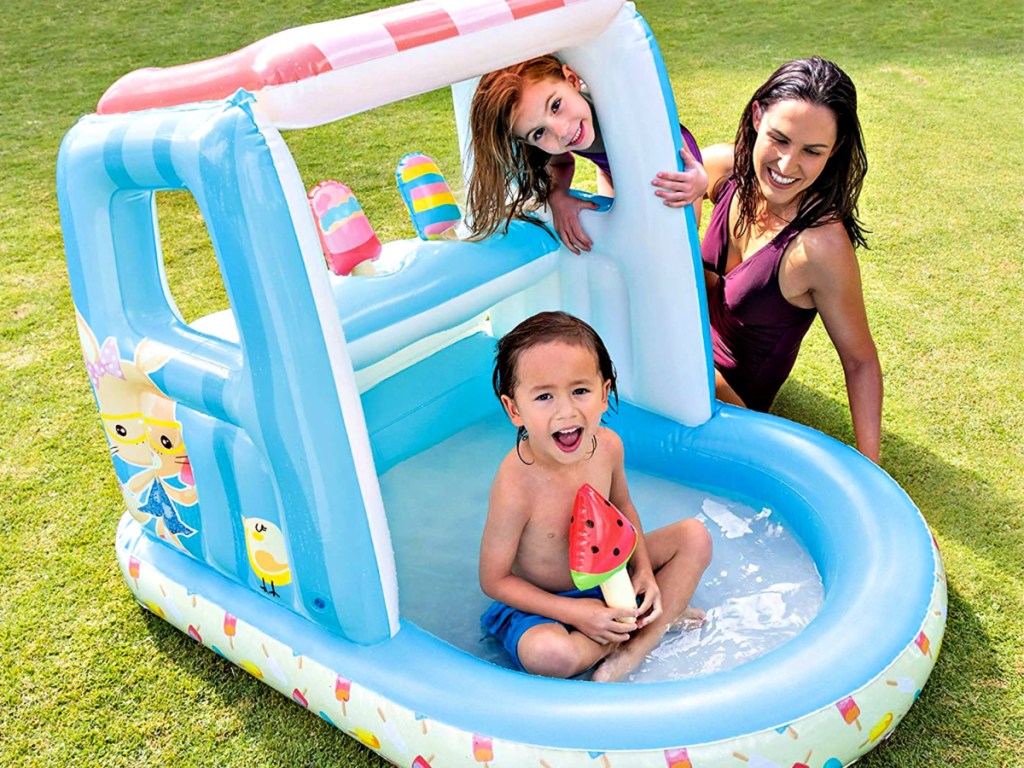 Kids playing Intex Ice Cream Stand Inflatable Playhouse and Pool with mom