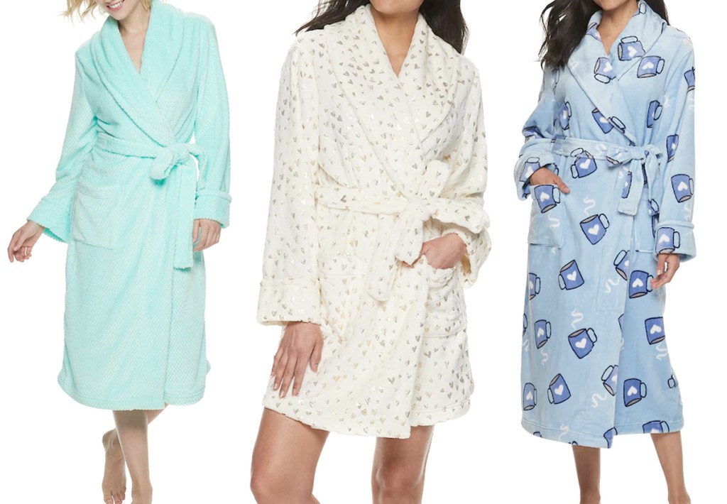 three women modeling bathrobes in mint green, white with gold stars, and blue with coffee mugs print