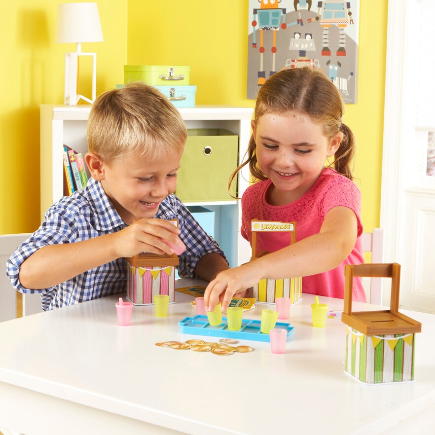 Kids playing Lil Lemonade Stand game