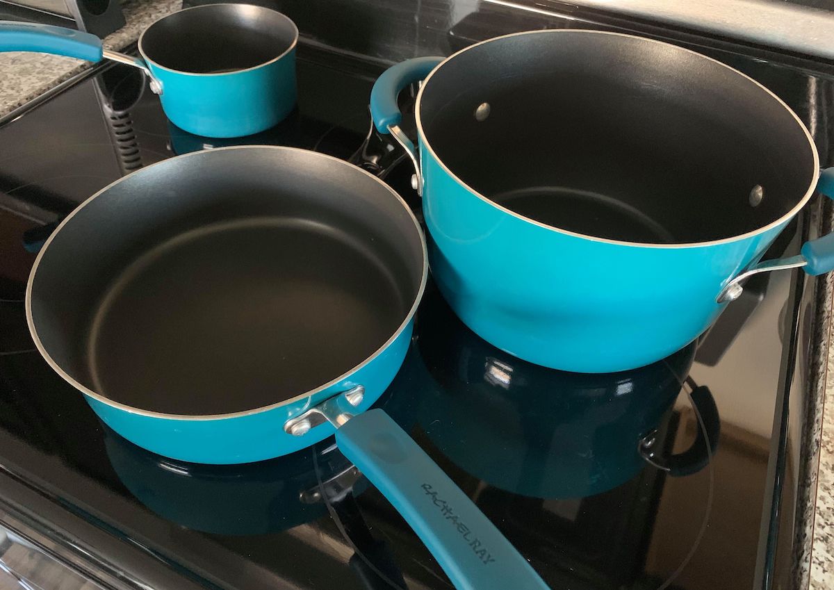 blue pots and pans on stovetop