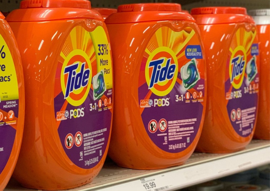 three tubs of laundry detergent pacs on store shelf