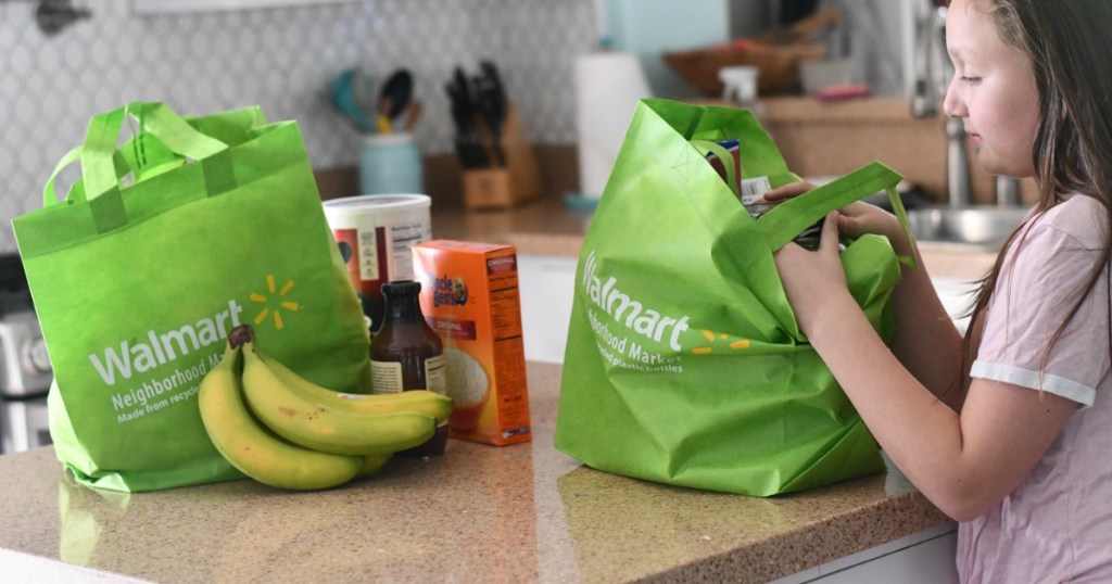 Girl removing items from Walmart grocery order