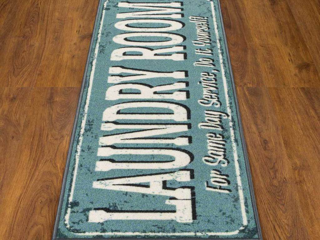 blue laundry room runner rug on wood floor