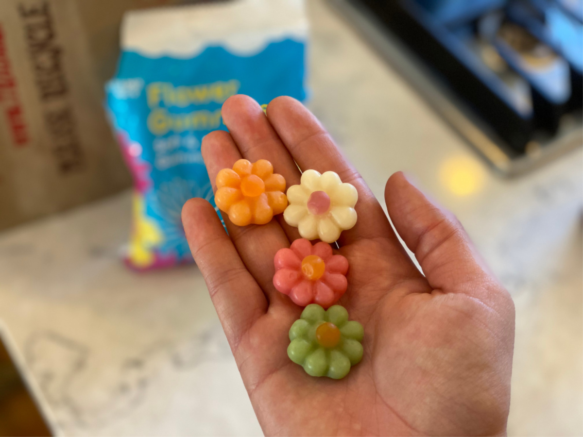 flower gummies in hand