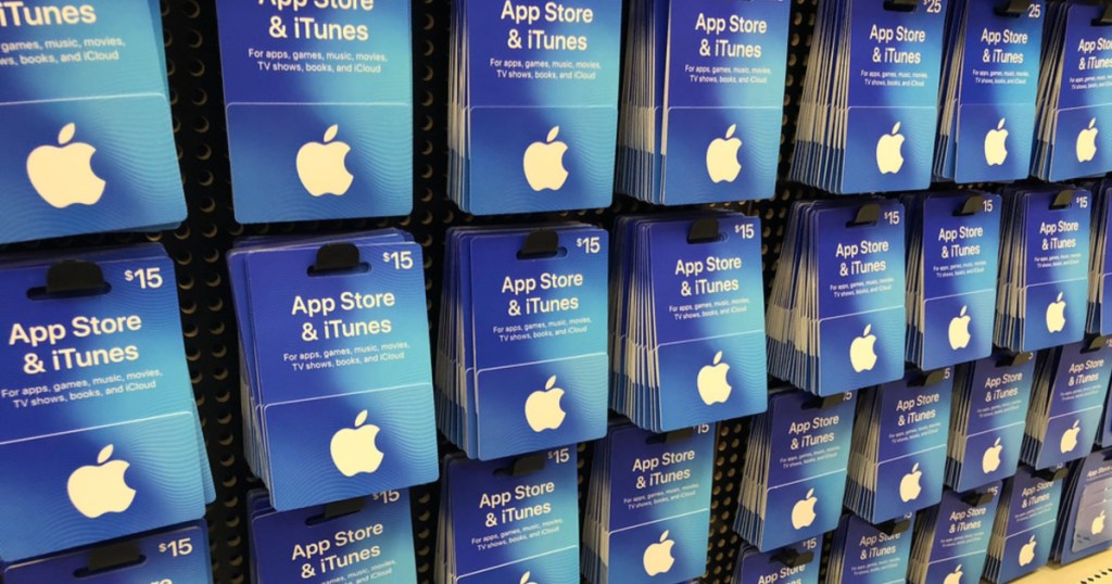 several itunes gift card on shelfs against wall