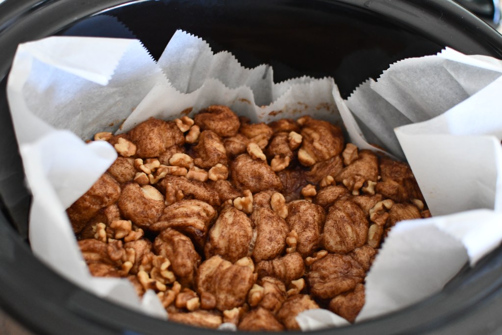 slow cooker with monkey bread in it