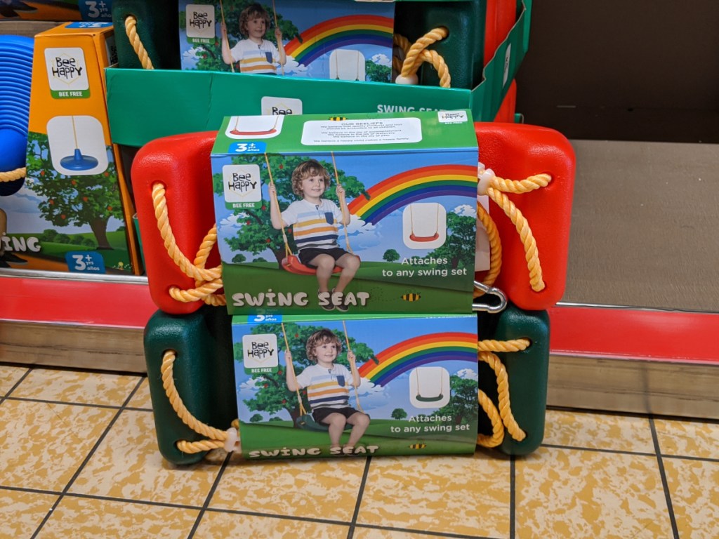 two bee happy swings seats stacked on each other at aldi