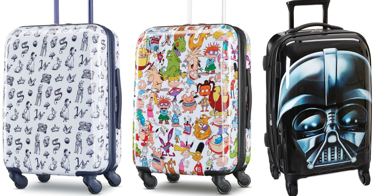 stock images of three suitcases with character prints