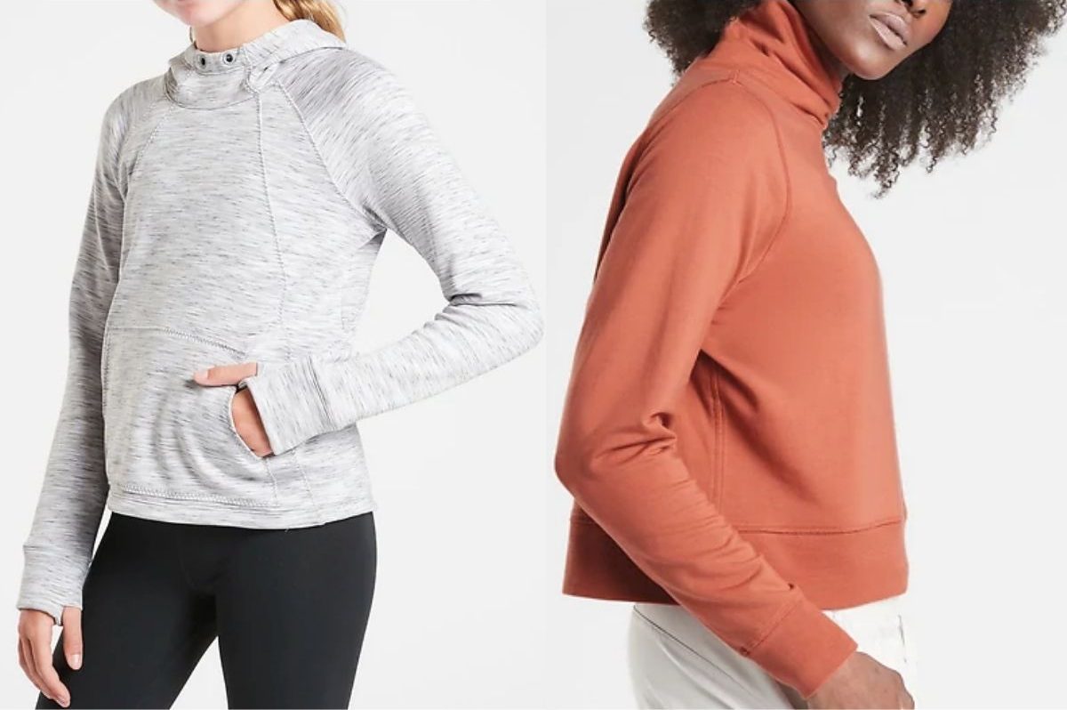 two women wearing funnel neck sweatshirt