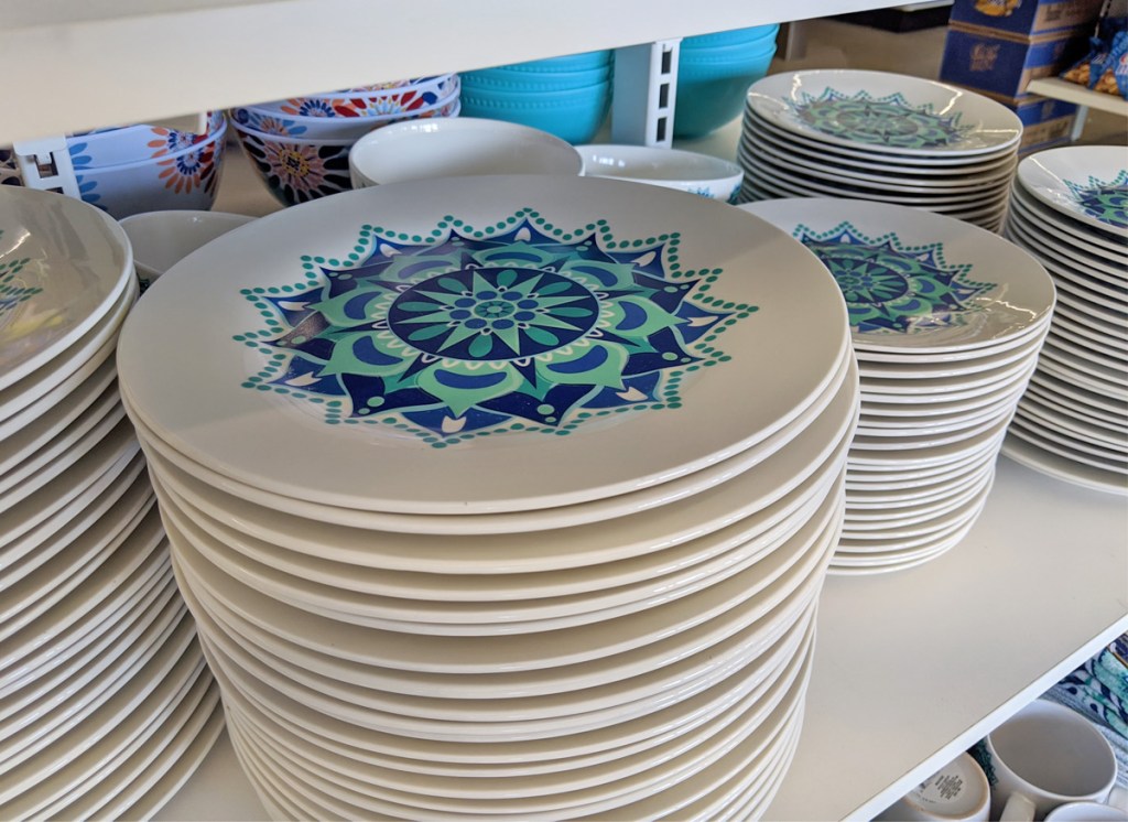 store display with blue and turquoise mediterranean themed dinner plates