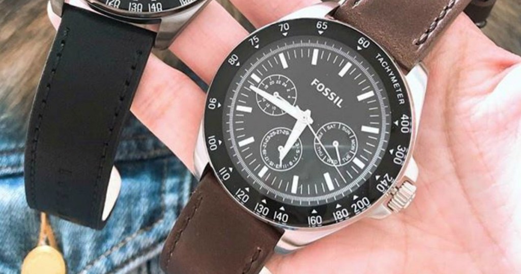 Fossil Men's Watch held in hand