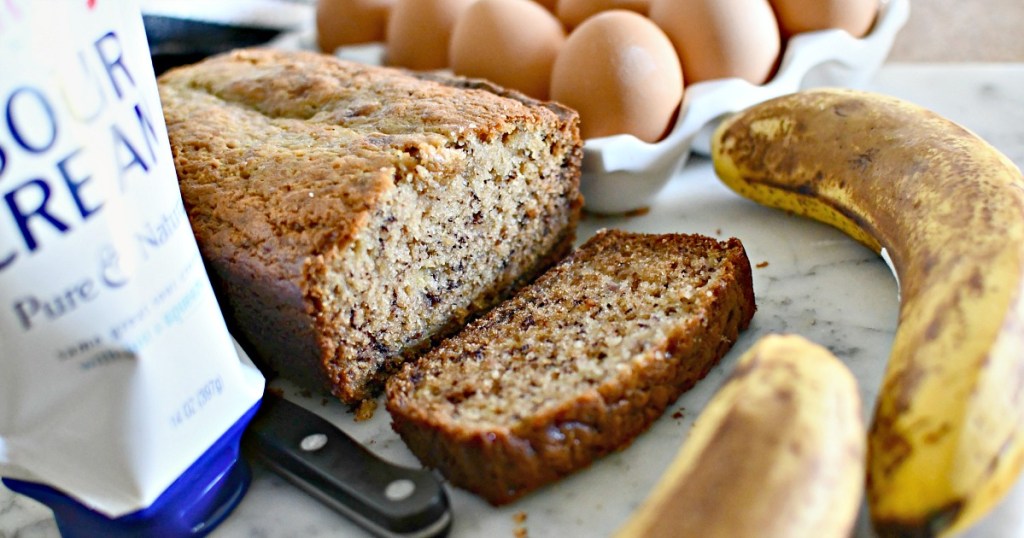 banana bread sliced on a cutting board