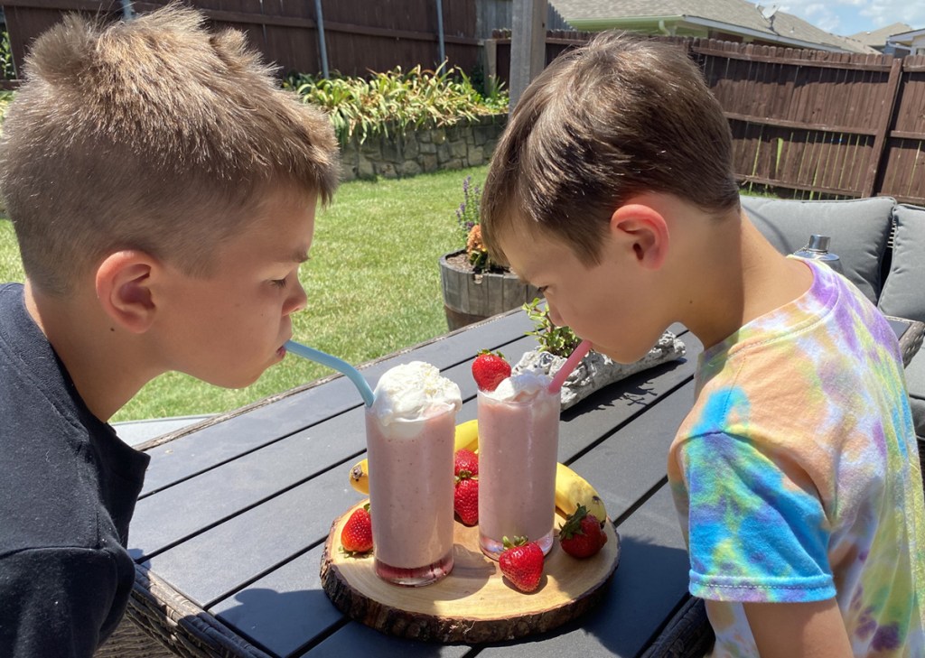 boys drinking smoothie