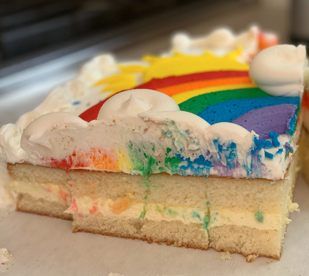 Costco corner piece with rainbow frosting 