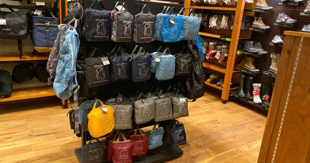 stowaway daypacks on display in a store 