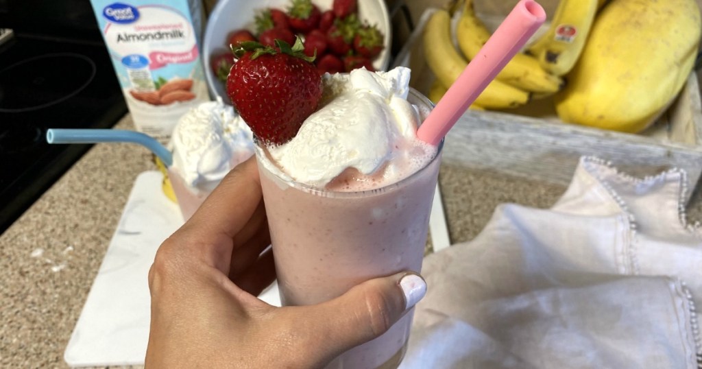 picking up strawberry banana smoothie 