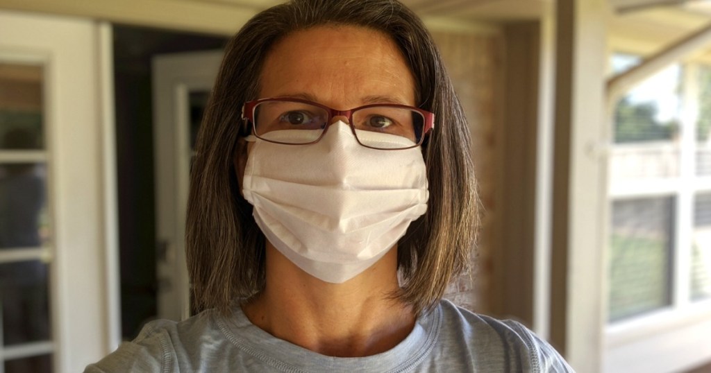 woman wearing disposable face mask