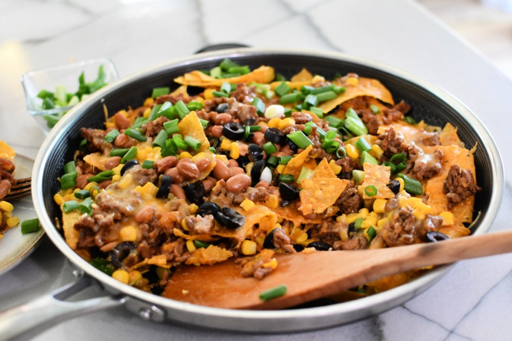 layered nachos in a skillet