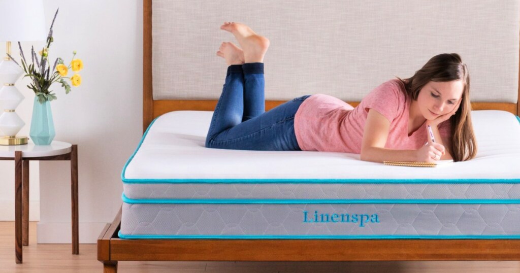 linenspa mattress with woman laying on top