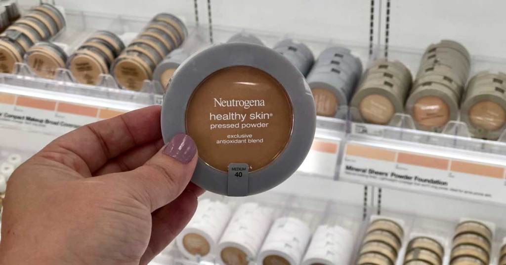 hand holding Neutrogena powder