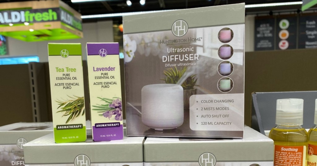 essential oils next to a diffuser