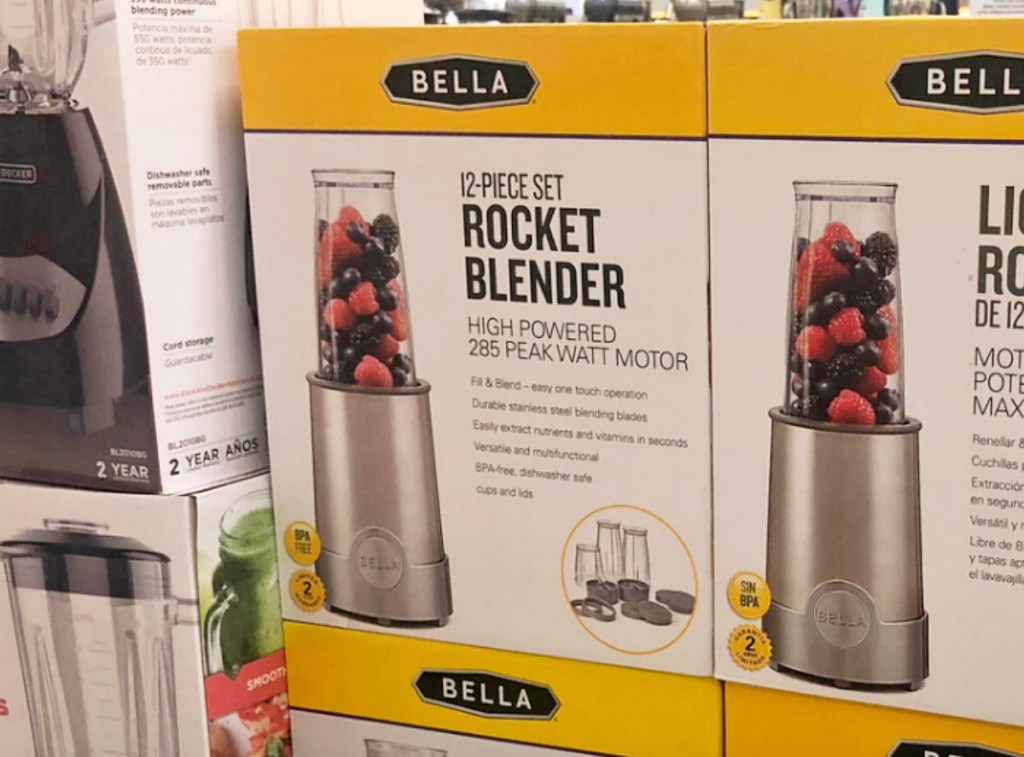 white and yellow boxes for a stainless steel rocket blender