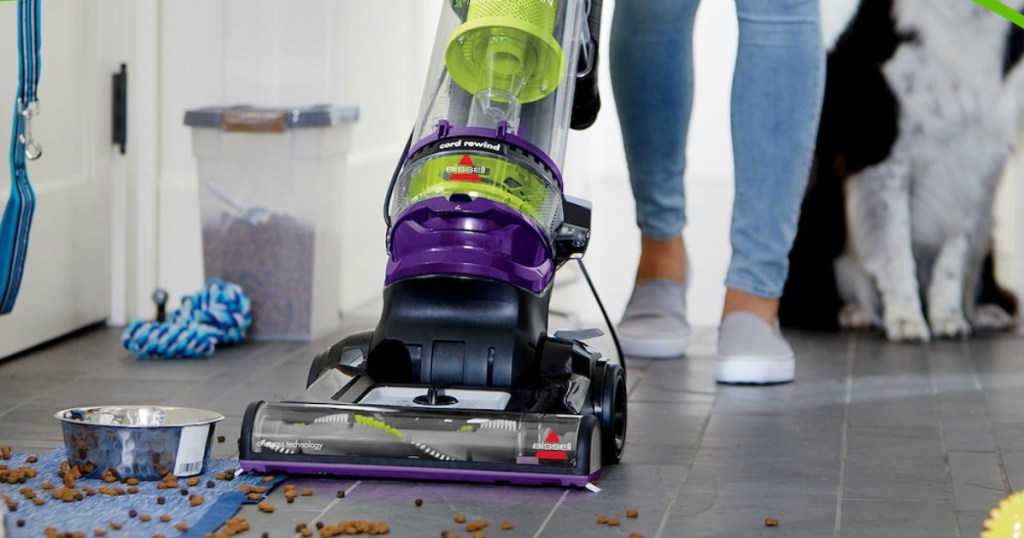 person using a vacuum