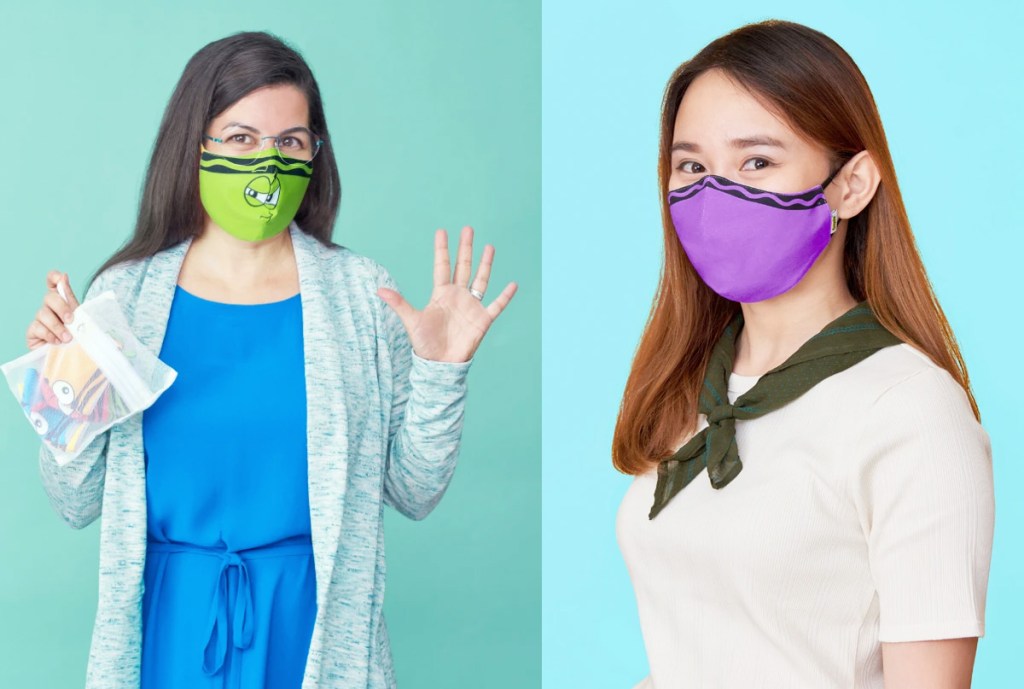 two women molding crayola themed face masks