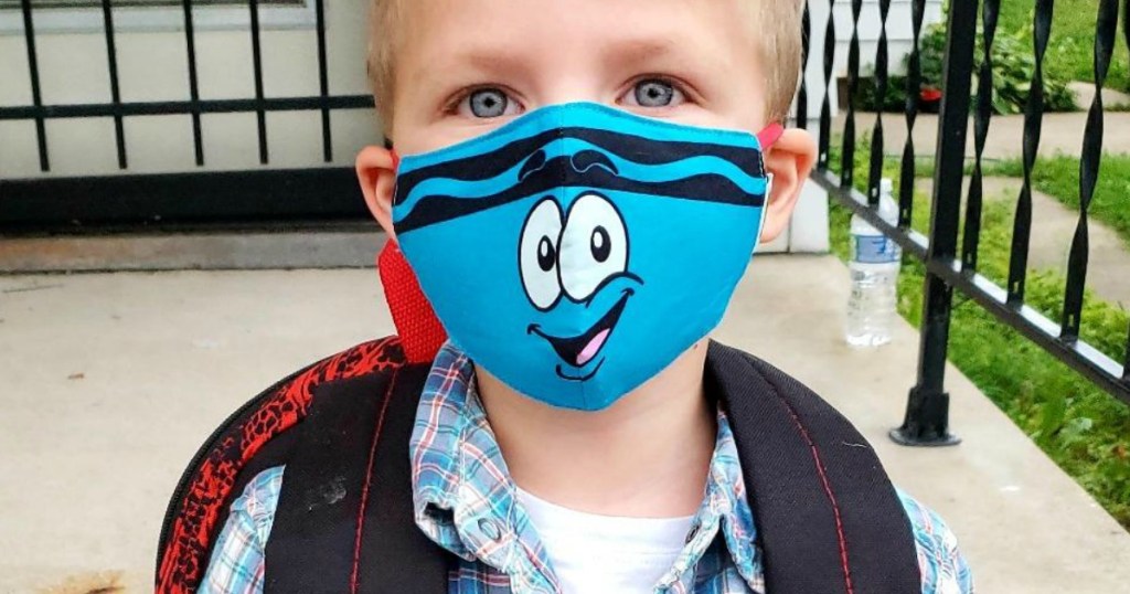 child wearing Crayola face mask 