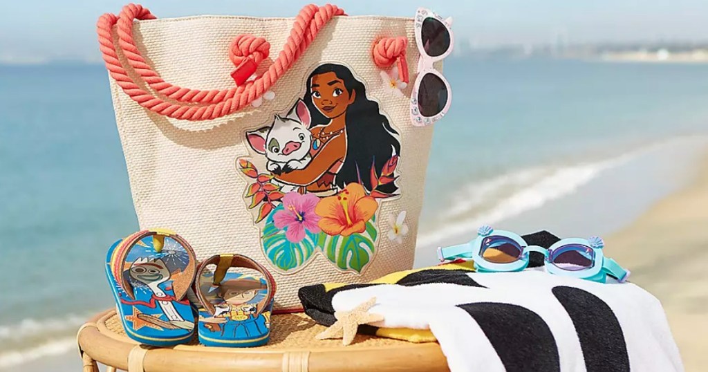 Disney beach bag, towel, sandals and sunglasses