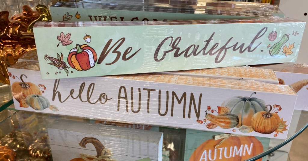 two fall signs at Dollar Tree