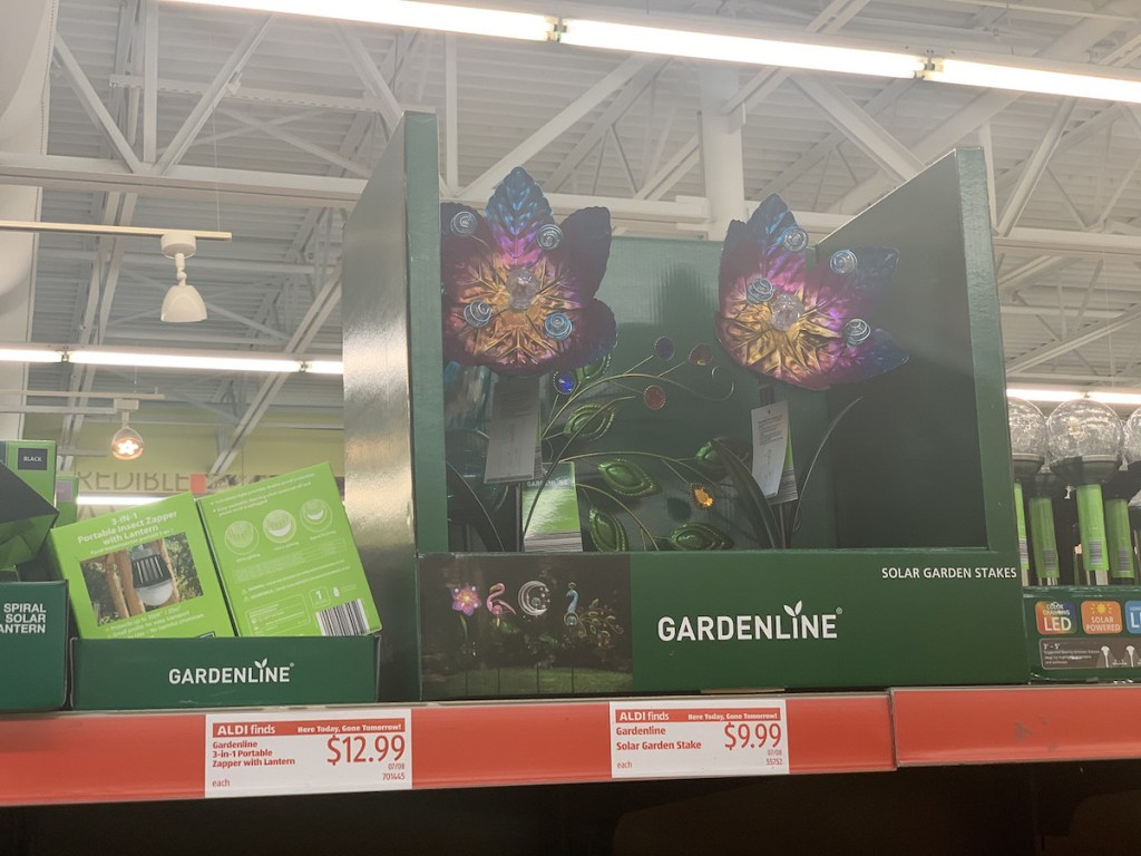 aldi shelf with gardenline solar garden stakes and lanterns