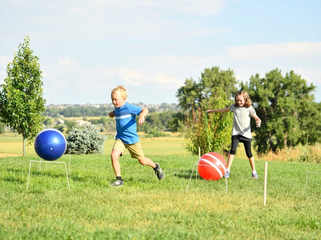 kids playing Giant Kick Croquet