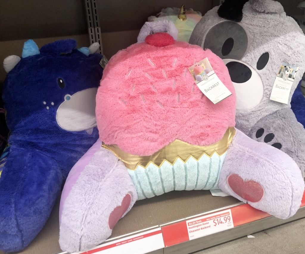 three kids backrest pillows in cupcake, walrus, and dog characters