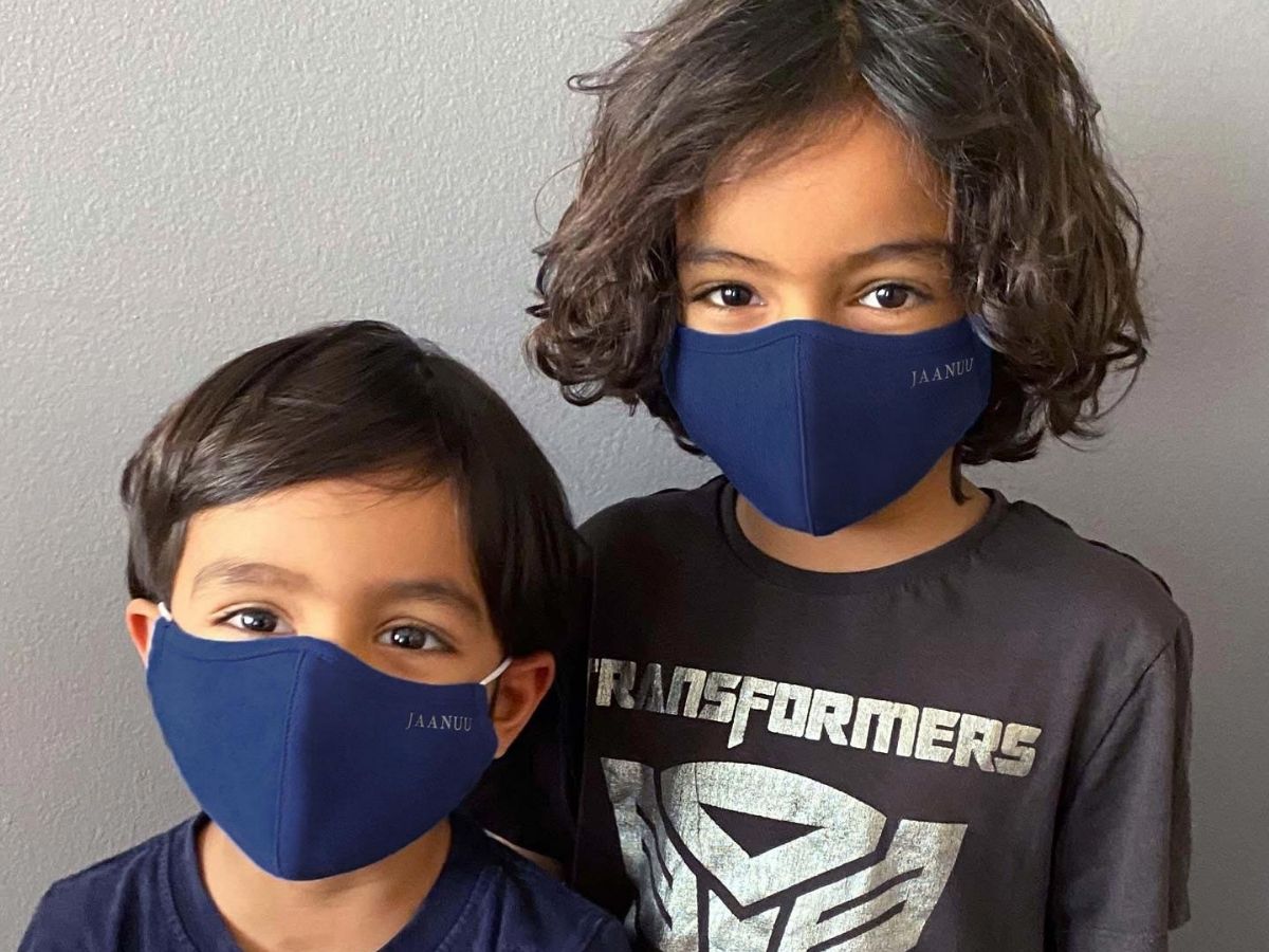 two kids wearing face masks