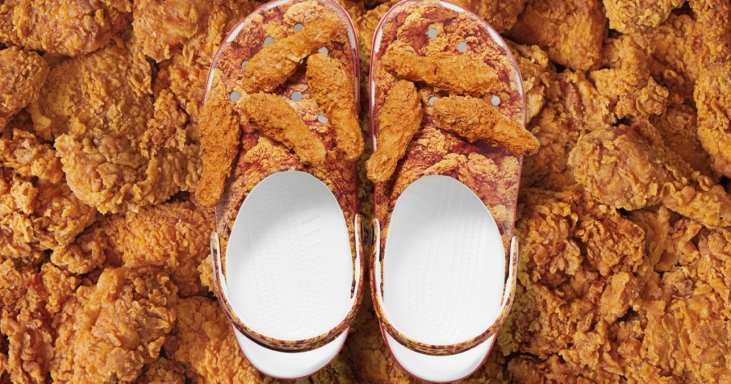 pair of kfc crocs with fried chicken in the background