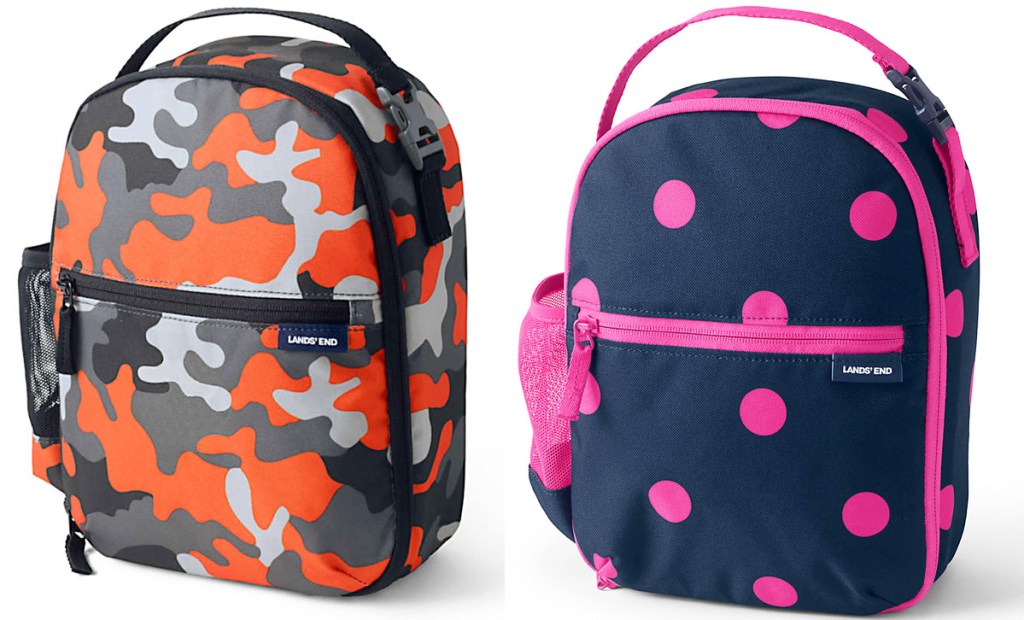 two kids lunch boxes in orange camo and navy and pink polka dot prints