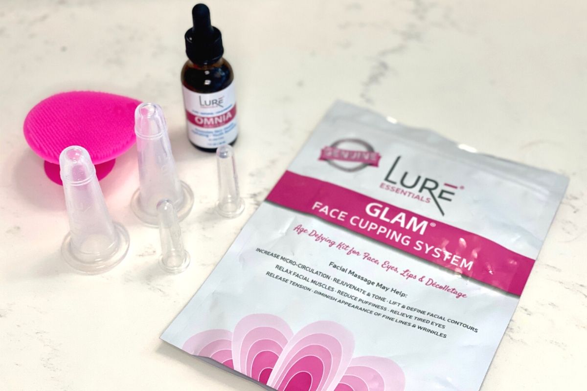 Lure Essentials face cupping system on a counter