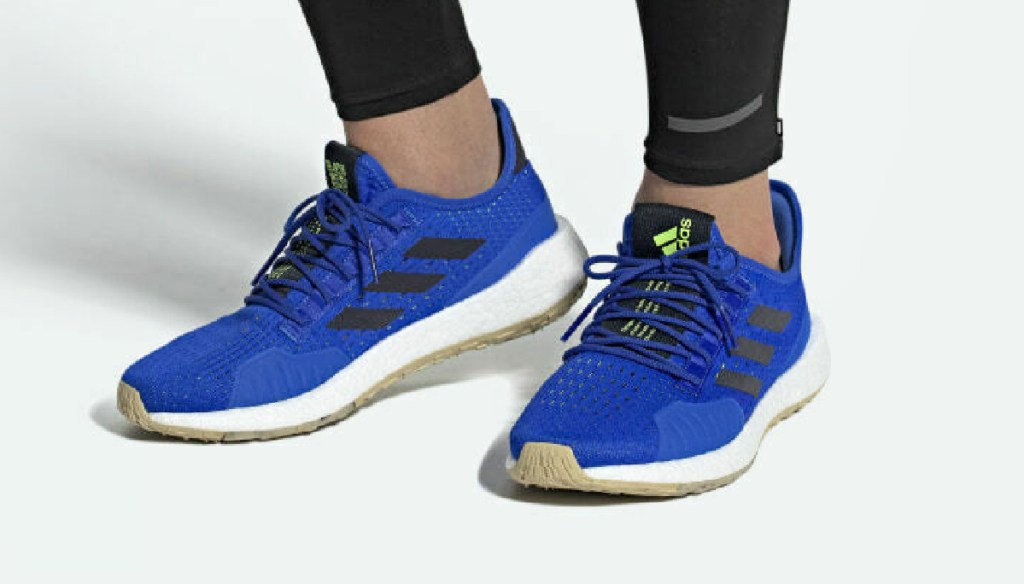 Man wearing Adidas Men's Pulseboost HD SUMMER.RDY Shoes