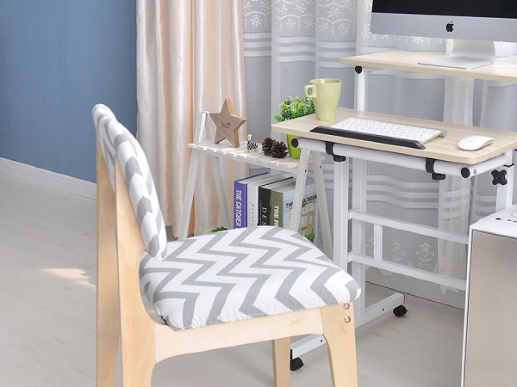 wood and white desk and desk chair in home