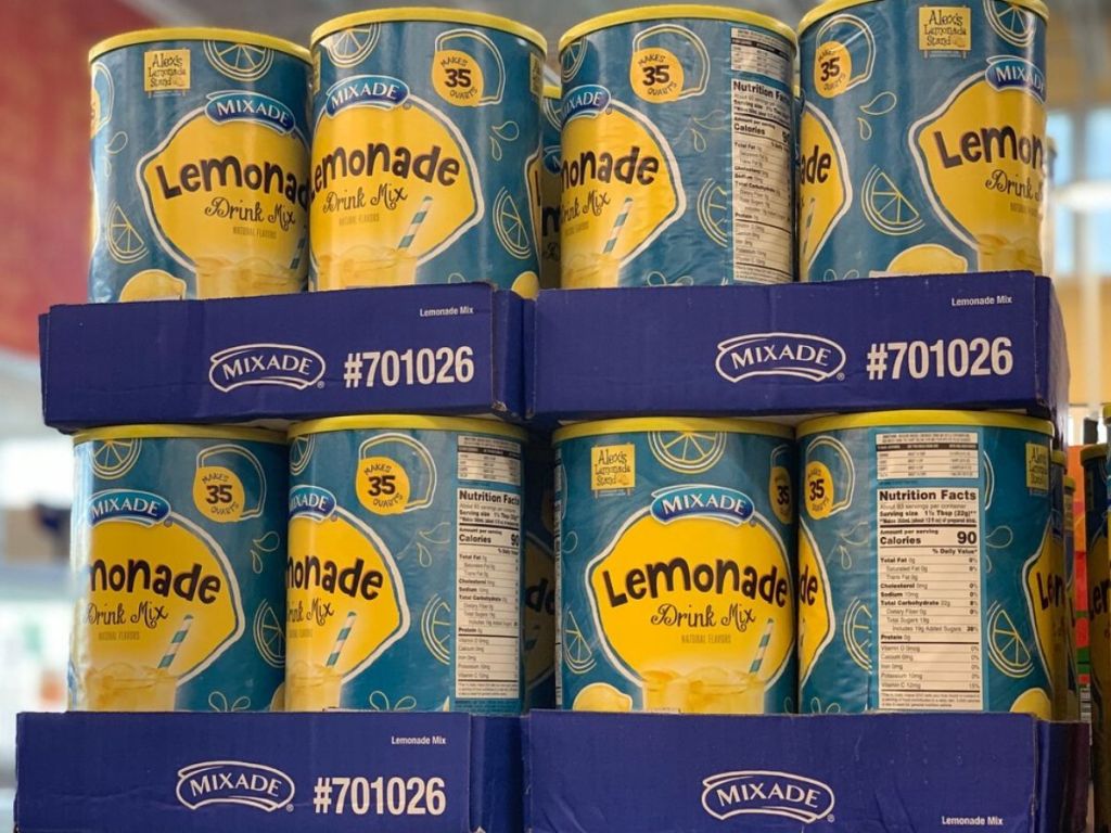 display of large containers of lemonade mix