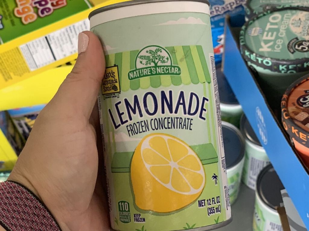 woman's hand holding can of frozen lemonade